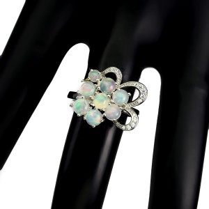 Srebrny pierścionek r 16 ogniste opale cyrkonie