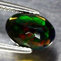 Opal czarny kamień naturalny 1.56ct AAA