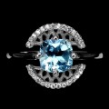 Pierścionek srebrny Sky Blue Topaz cyrkonie r 19