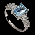 Pierścionek r 14 srebrny Sky Blue Topaz cyrkonie