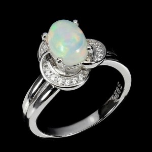 Delikatny pierścionek r 11 ognisty opal cyrkonie