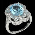 925 Pierścionek sky blue topaz białe topazy r 13