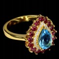 Pierścionek srebrny naturalny topaz swiss blue granaty rodolity r 12.5