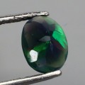 Opal czarny kamień naturalny 1.06ct AAA IF