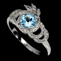 925 Pierścionek delikatny sky blue topaz białe topazy r 17