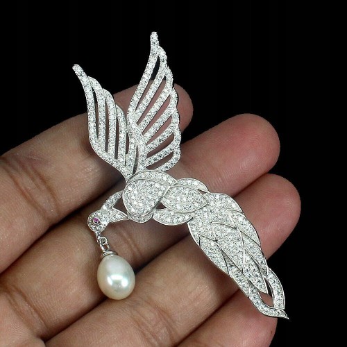 Broszka srebrna naturalna perła kremowa cyrkonie ptak 925