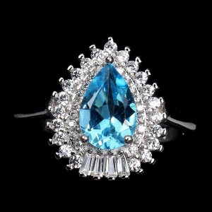 Piękny 925 pierścionek naturalny swiss blue topaz cyrkonie r 16