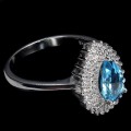 Piękny 925 pierścionek naturalny swiss blue topaz cyrkonie r 16