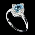 Delikatny pierścionek srebrny naturalny Sky Blue Topaz cyrkonie r 12