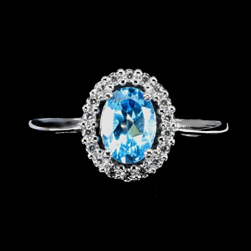Delikatny pierścionek swiss blue topaz cyrkonie r 17 925