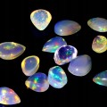 Opale ogniste 4.15ct kamienie naturalne 15 sztuk
