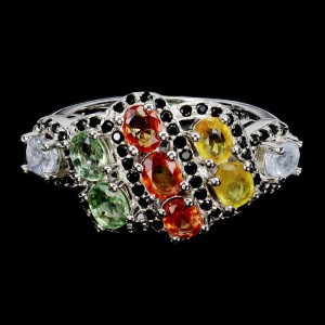 Pierścionek srebrny naturalne szafiry Songea czarne spinele r 12