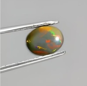 Opal czarny kamień naturalny 0.87ct IF AAA