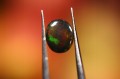 Opal czarny kamień naturalny 0.87ct IF AAA