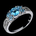 Srebrny delikatny pierścionek r 16 naturalne sky blue topazy cyrkonie