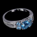 Srebrny delikatny pierścionek r 16 naturalne sky blue topazy cyrkonie