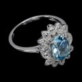 Pierścionek elegancki naturalny sky blue topaz białe topazy r 14 925