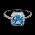 Delikatny pierścionek swiss blue topaz cyrkonie r 14 925