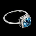 Delikatny pierścionek swiss blue topaz cyrkonie r 14 925
