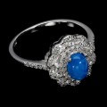Srebrny elegancki pierścionek naturalny niebieski opal cyrkonie r 16