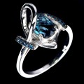 925 Srebrny elegancki delikatny pierścionek topaz london blue cyrkonie r 20
