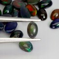 Opale czarne 4.25ct kamienie naturalne 31 sztuk AAA