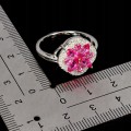 Srebrny elegancki pierścionek naturalne różowe topazy cyrkonie r 18.5