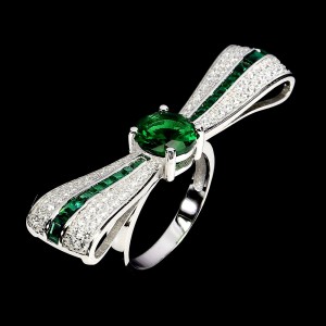 Srebrny piękny zjawiskowy pierścionek zielone cyrkonie kokarda r 17