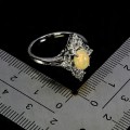 Pierścionek zjawiskowy delikatny naturalny opal ognisty r 14 białe topazy