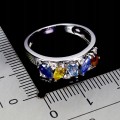 Srebrny elegancki pierścionek naturalne szafiry Songea białe topazy r 14