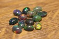 Opale czarne 4.35ct kamienie naturalne 13 sztuk