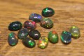 Opale czarne 4.35ct kamienie naturalne 13 sztuk
