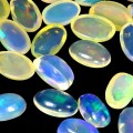 Opale ogniste 5.19 ct kamienie naturalne 34 sztuki