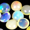 Opale ogniste 4.6 ct kamienie naturalne 18 sztuk