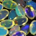 Opale ogniste 5.07 ct kamienie naturalne 34 sztuki