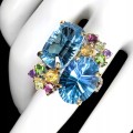 Zjawiskowy pierścionek srebrny naturalne topazy swiss blue 31 ct r 16.5