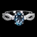 Srebrny elegancki delikatny pierścionek topaz london blue cyrkonie r 12