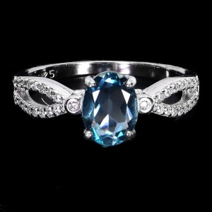 Srebrny elegancki delikatny pierścionek topaz london blue cyrkonie r 12