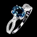 Srebrny elegancki delikatny pierścionek topaz london blue cyrkonie r 12