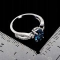 Srebrny elegancki delikatny pierścionek topaz london blue cyrkonie r 12