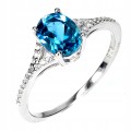 Srebrny elegancki delikatny pierścionek topaz london blue cyrkonie r 12.5