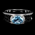 Srebrny elegancki pierścionek naturalny sky topaz czarne spinele r 14 925