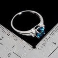 Srebrny elegancki delikatny pierścionek topaz london blue cyrkonie r 14