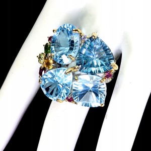 925 Zjawiskowy pierścionek srebrny naturalne topazy swiss blue 44 ct r 18