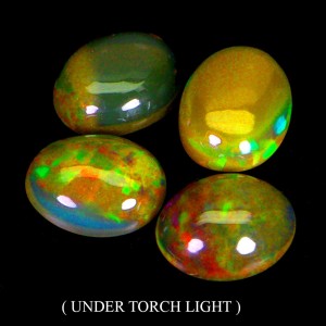 Opale ogniste 4.24 ct kamienie naturalne 4 sztuki