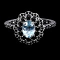 Srebrny elegancki pierścionek naturalny sky topaz czarne spinele r 17 925