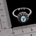 Srebrny elegancki pierścionek naturalny sky topaz czarne spinele r 17 925