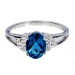 Srebrny elegancki delikatny pierścionek topaz london blue cyrkonie r 12
