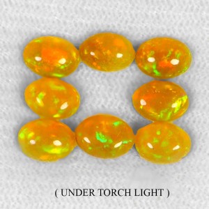 Opale ogniste 4.76 ct kamienie naturalne 8 sztuk