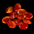 Opale ogniste pomarańczowe 4.28 ct kamienie naturalne 11 sztuk